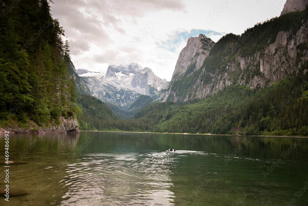 View of the Austria nature - high alpine and lakes in valley. Summer nature with green colors. View of the Austria nature - high alpine and lakes in valley. Summer nature with green colors.