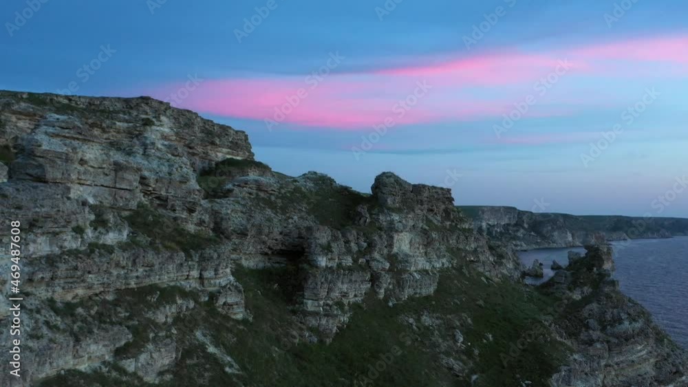 DJI_0133Rocky coastline Dzhangul aerial view at blue hour. Beautiful steep shore and sea landscape at dusk DJI_0133Rocky coastline Dzhangul aerial view at blue hour. Beautiful steep shore and sea landscape at dusk