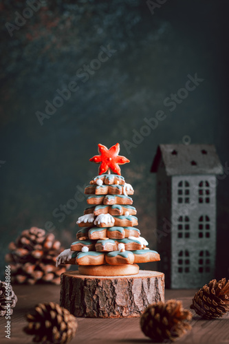Gingerbread Christmas tree on dark table, Christmas card photo