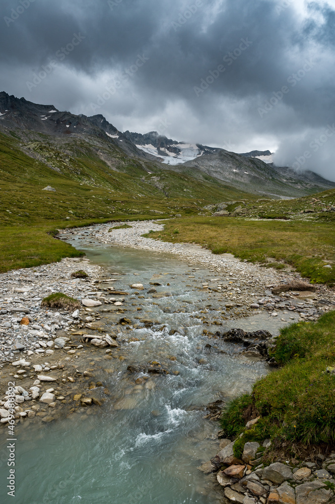 Val Maighels with creek and Maighels glacier in the distance, Surselva