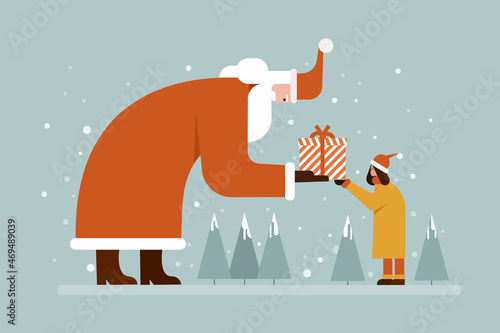 Santa Claus giving a gift to a little girl in a winter background