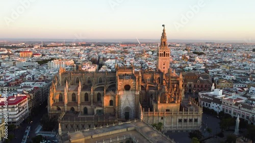 Catedral de Sevilla. Drone shot of the beautiful Spanish city of Seville at the sunrise, UHD, 4K