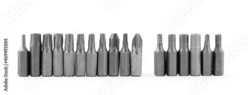 Drill bits of different sizes isolated over white background photo