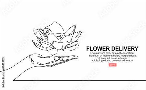 Hand holds flowers.Business concept of online ordering and flower delivery service gifts. It can be used as a banner, advertisement, promotional.