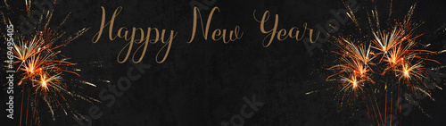HAPPY NEW YEAR 2022 - Festive silvester background panorama greeting card banner long - Golden fireworks in the dark black night..