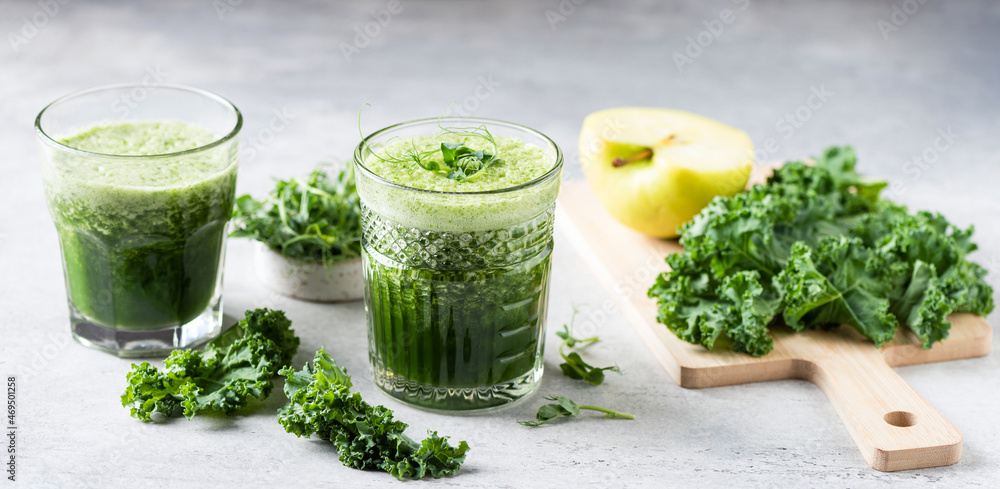 Healthy green smoothie, detox juice with kale apple celery cucumber. Web banner orientation Healthy green smoothie, detox juice with kale apple celery cucumber. Web banner orientation