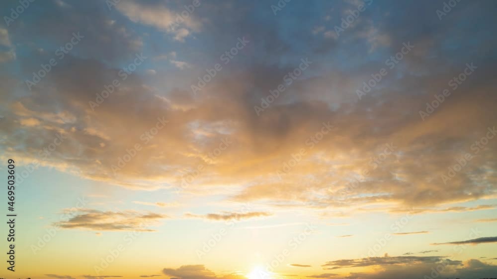 Clouds fly across the sky at sunset. Timelapse Clouds fly across the sky at sunset. Timelapse