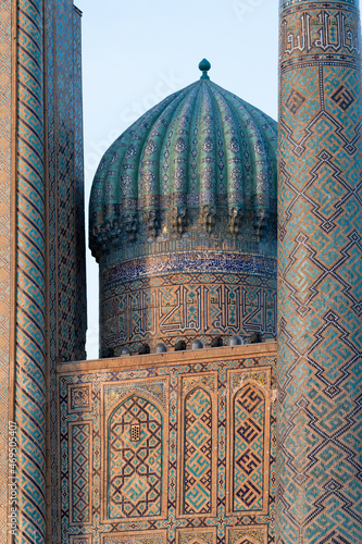 Wallpaper Mural A beautiful historical mosque in Samarkand, Uzbekistan, showcasing intricate blue tiles and traditional Islamic architecture, reflecting the rich cultural heritage and history of the region. Torontodigital.ca