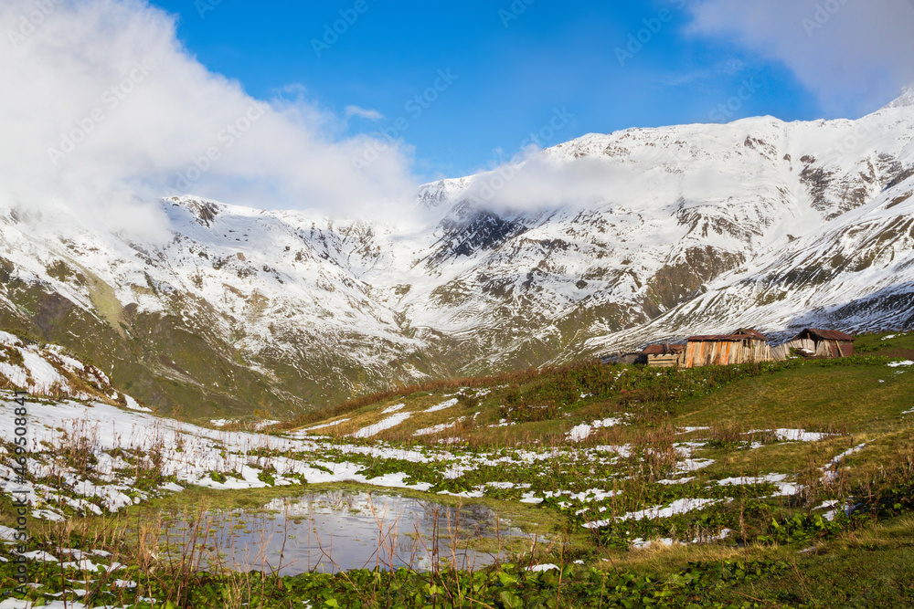 The trail to Koruldi lakes from Mestia. Big Caucasus. First snow. Abandoned small house. Introvert's Paradise