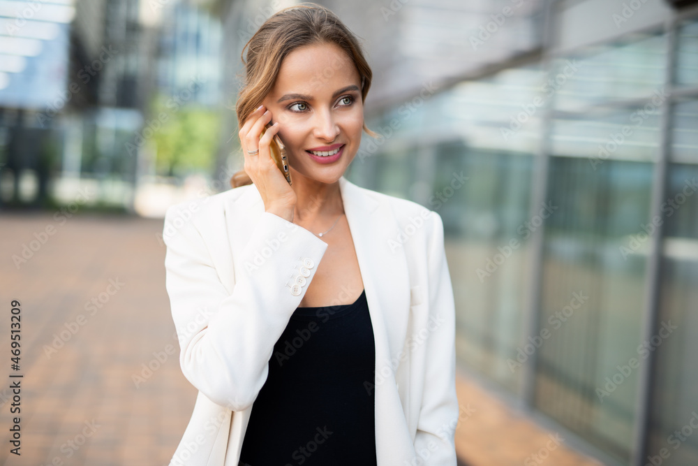 Businesswoman talking on the phone Businesswoman talking on the phone