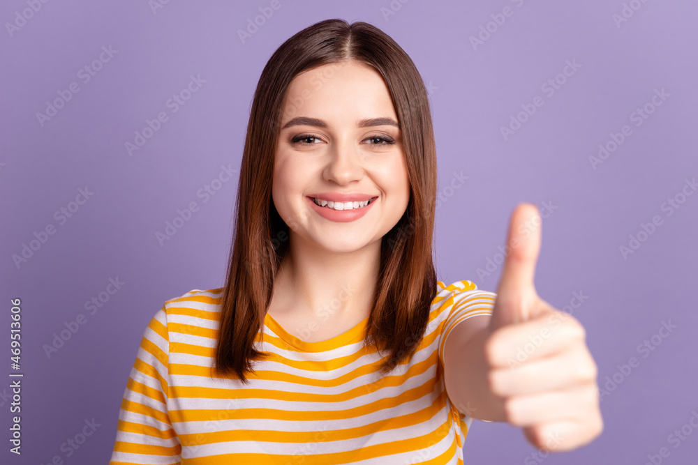 Photo of young lovely lady good mood show thumb-up cool ads approve great isolated over violet color background Photo of young lovely lady good mood show thumb-up cool ads approve great isolated over violet color background