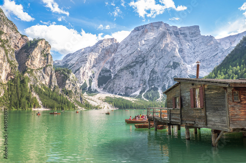 Lake Braies  also known as Pragser Wildsee or Lago di Braies  in Dolomites Mountains  Sudtirol  Italy. Romantic place with typical wooden boats on the alpine lake. Hiking travel and adventure.