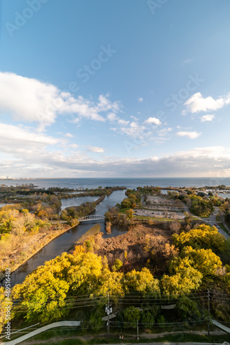 Photography Drone views of Humber bay park  overlooking the lake  and fall tree colours by P