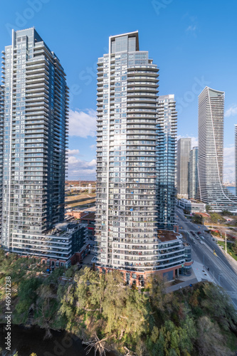 Canvas Print Drone Views of condos and Humber bay shores with  brown trees tops Fall colours
