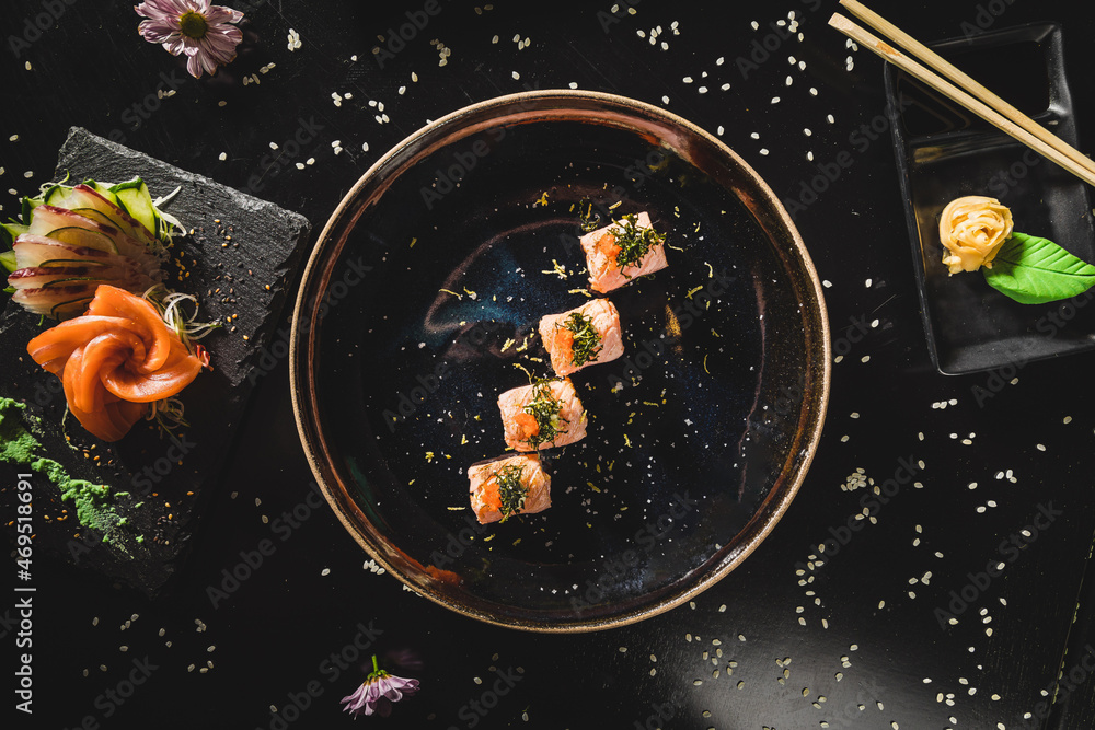 Perfect Sushi Japanese Asian Seafood Food Dish Menu Gourmet Restaurant Chef on Dark Background Perfect Sushi Japanese Asian Seafood Food Dish Menu Gourmet Restaurant Chef on Dark Background