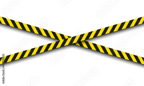 Yellow and black danger cross lines ribbons. photo