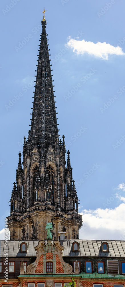 View of the tower peak of the memorial St. Nikolai in Hamburg, Germany
