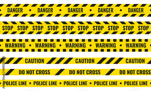 Yellow and black danger ribbons. Police line, crime scene, do not cross, construction site road