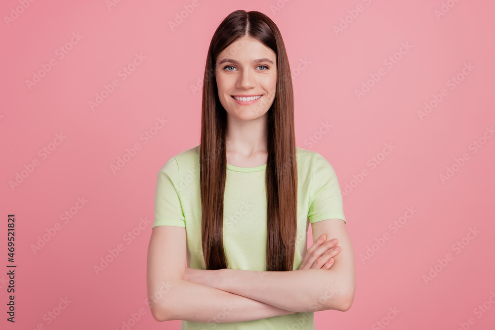 Portrait of nice good girl with happy smile holding arms crossed confident isolated on pink background Portrait of nice good girl with happy smile holding arms crossed confident isolated on pink background
