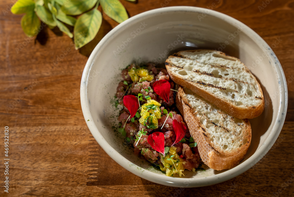 Elegant and delicious food on restaurant. Plate with tasty meal on the wooden table. Gourmet cuisine, lunch, dinner, beautiful, modern Elegant and delicious food on restaurant. Plate with tasty meal on the wooden table. Gourmet cuisine, lunch, dinner, beautiful, modern