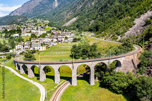 Aerial of the Brusio spiral viaduct, UNESCO World Heritage Site, Rhaetian Railway, Switzerland photo