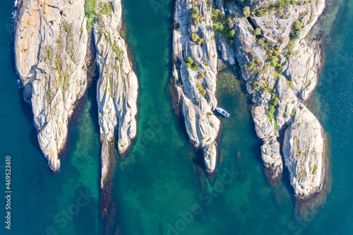 Wallpaper Mural Aerial shot of a narrow fjord with turquoise waters surrounded by cliffs in Norway. Torontodigital.ca