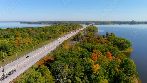 Transcanada highway, Lake of Two Mountains Bridge and fall season colors in the outskirts of Montreal. photo