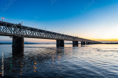 Giant bridge spanning over the Amur River at sunset, Khabarovsk, Khabarovsk Krai