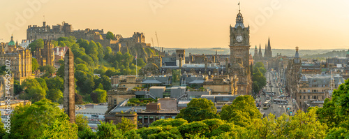 View of Edinburgh Castle, Balmoral Hotel and Princes Street from Calton Hill at golden hour, Edinburgh, Lothian, Scotland photo