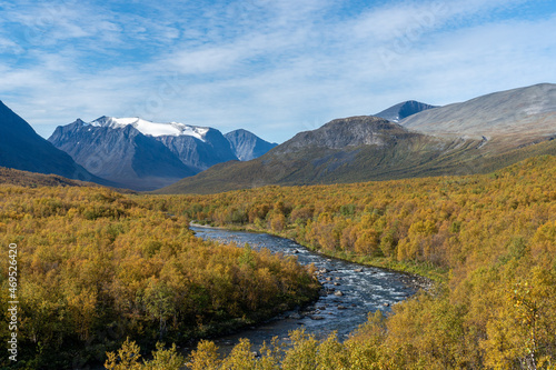 River winding through a colorful autumn landscape in the Kiruna region near Kebnekaise. 