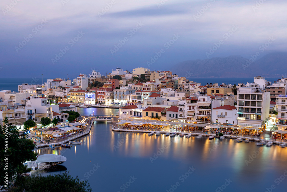 Agios Nikolaos old town with lake in its centre at dusk, Lasithi prefecture, Crete, Greek Islands Agios Nikolaos old town with lake in its centre at dusk, Lasithi prefecture, Crete, Greek Islands