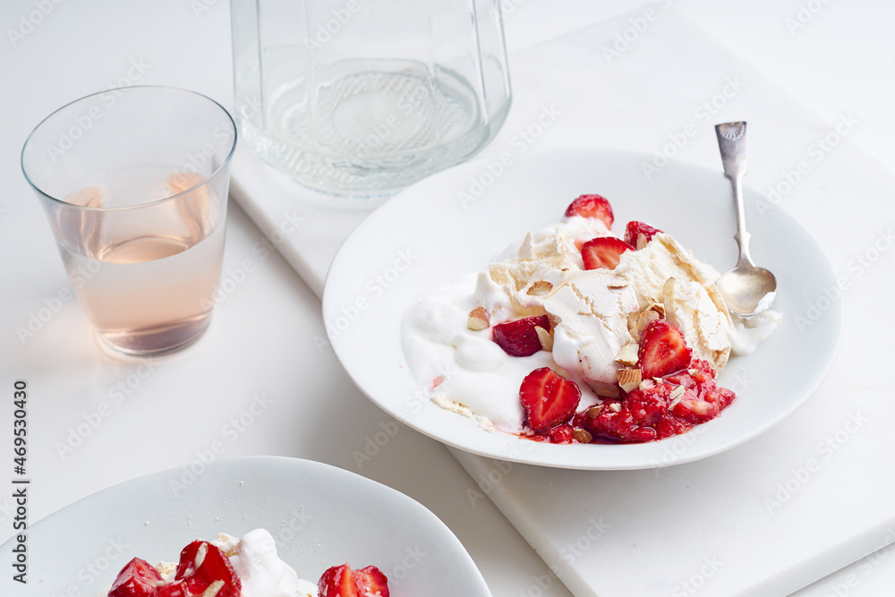 Dessert with strawberries, meringue and whipped cream Dessert with strawberries, meringue and whipped cream