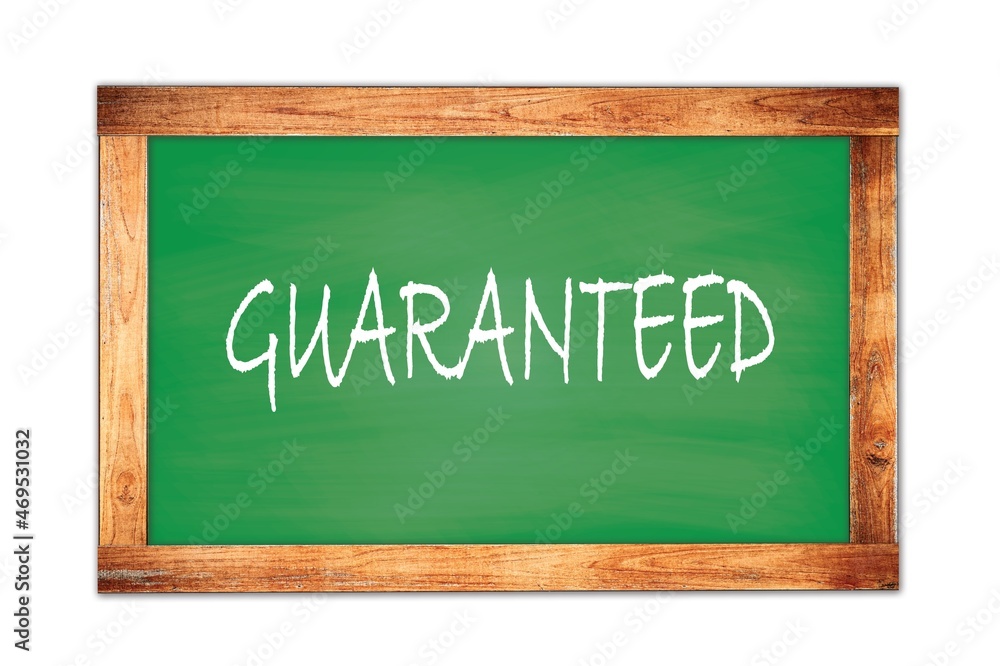 GUARANTEED text written on green school board. GUARANTEED text written on green school board.