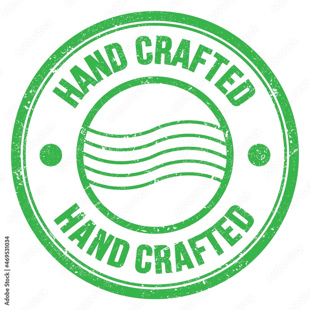 HAND CRAFTED text written on green round postal stamp sign HAND CRAFTED text written on green round postal stamp sign