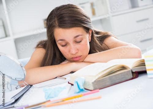 Woman is sleeping after productive day at home.