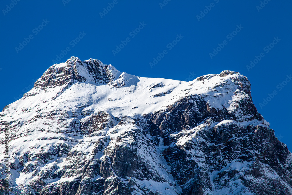 alpine peak with snow and ice