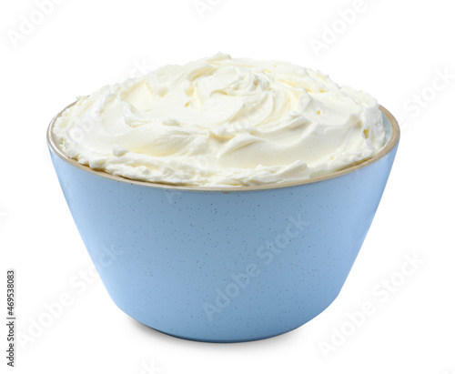 Bowl of tasty cream cheese isolated on white