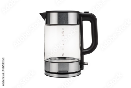 Glass, electric, modern transparent kettle on a white background. Close-up.