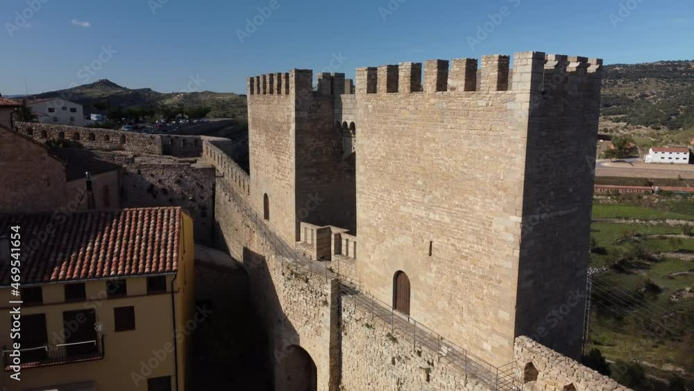 Drone flight towards medieval walls and towers of San Miguel gate in Morella, Castellon, Spain Drone flight towards medieval walls and towers of San Miguel gate in Morella, Castellon, Spain
