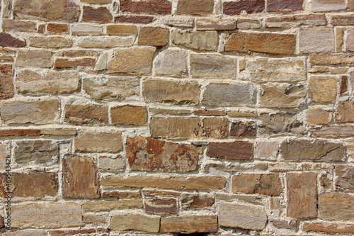 rough wall of different bricks background