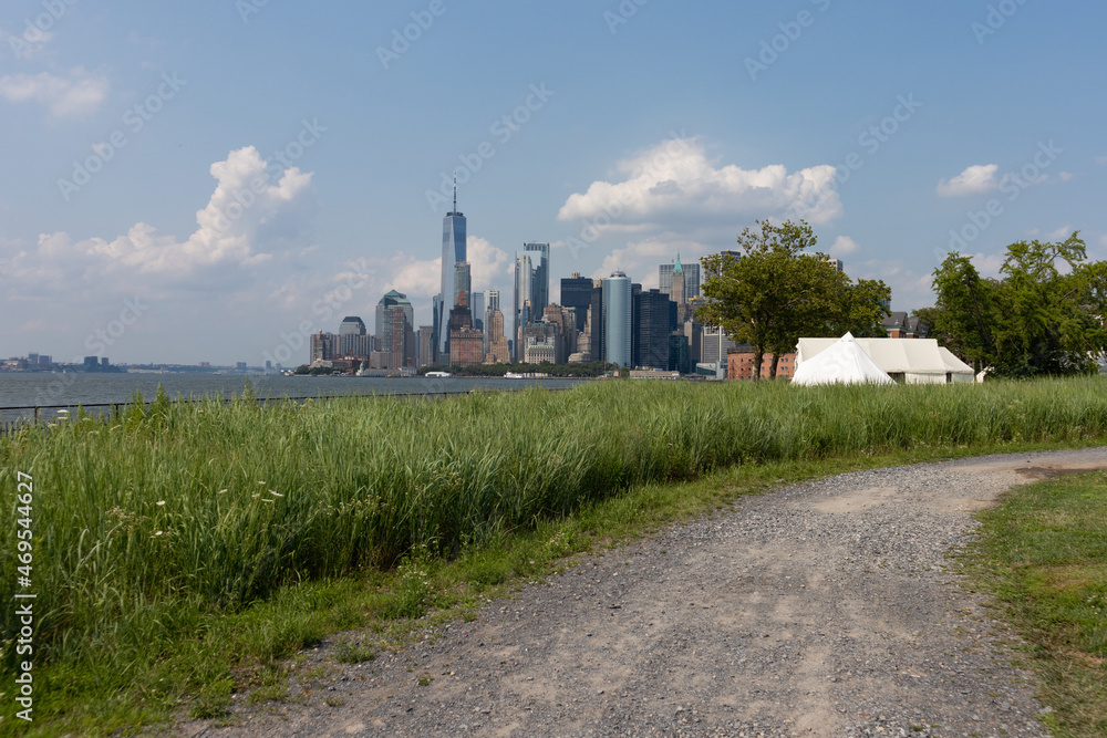Empty Curving Trail on Governors Island with a view of the Lower Manhattan New York City Skyline during Summer