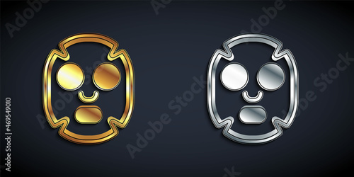 Gold and silver Facial cosmetic mask icon isolated on black background. Cosmetology, medicine and health care. Long shadow style. Vector