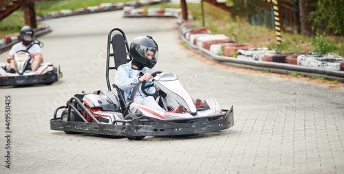 Karting. motorsport road racing with open-wheel four wheeled vehicles at go-karts