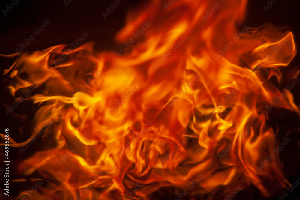 Fire flamme background as symbol of hell and eternal pain. Close up.