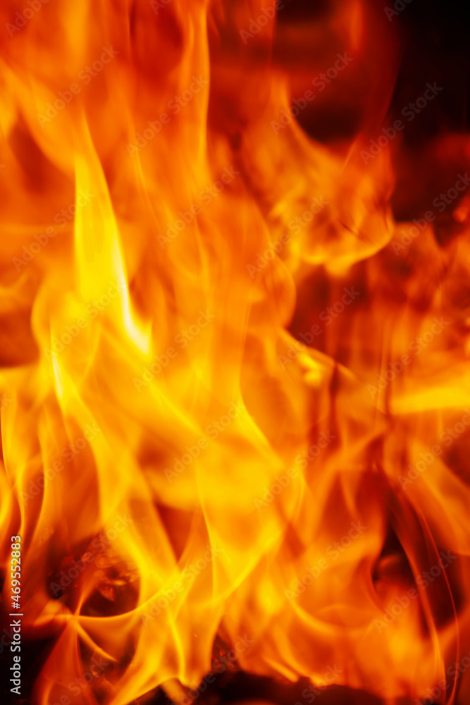 Close up fire flamme background as symbol of hell and eternal pain. Vertical image. Close up fire flamme background as symbol of hell and eternal pain. Vertical image.