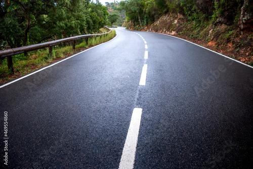 Wallpaper Mural The paved road passes through the mountains and forests of Spain. Catalonia. Torontodigital.ca