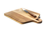 Wooden cutting board with knife isolated on white. Cooking utensils