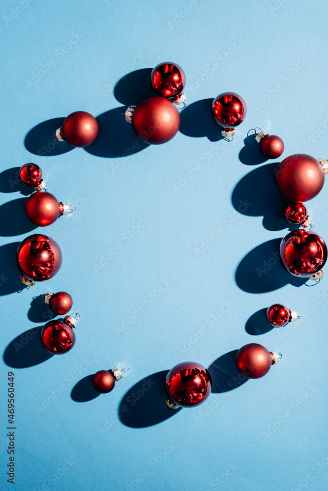 red christmas balls on a blue background