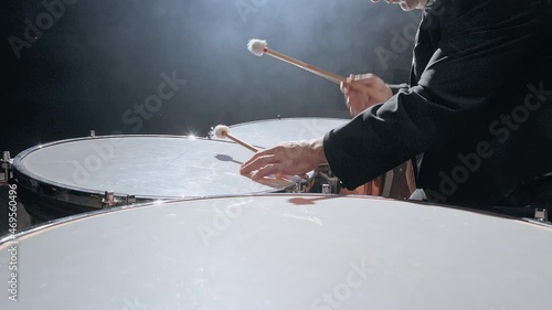 Musician playing the timpani photo