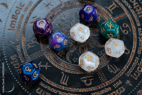 Zodiac horoscope with divination dice photo